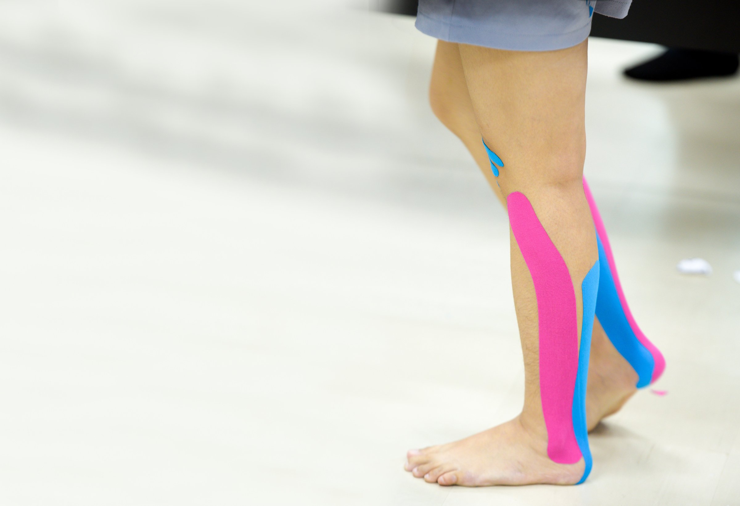 Leg With Physiotherapy Kinesio Tape